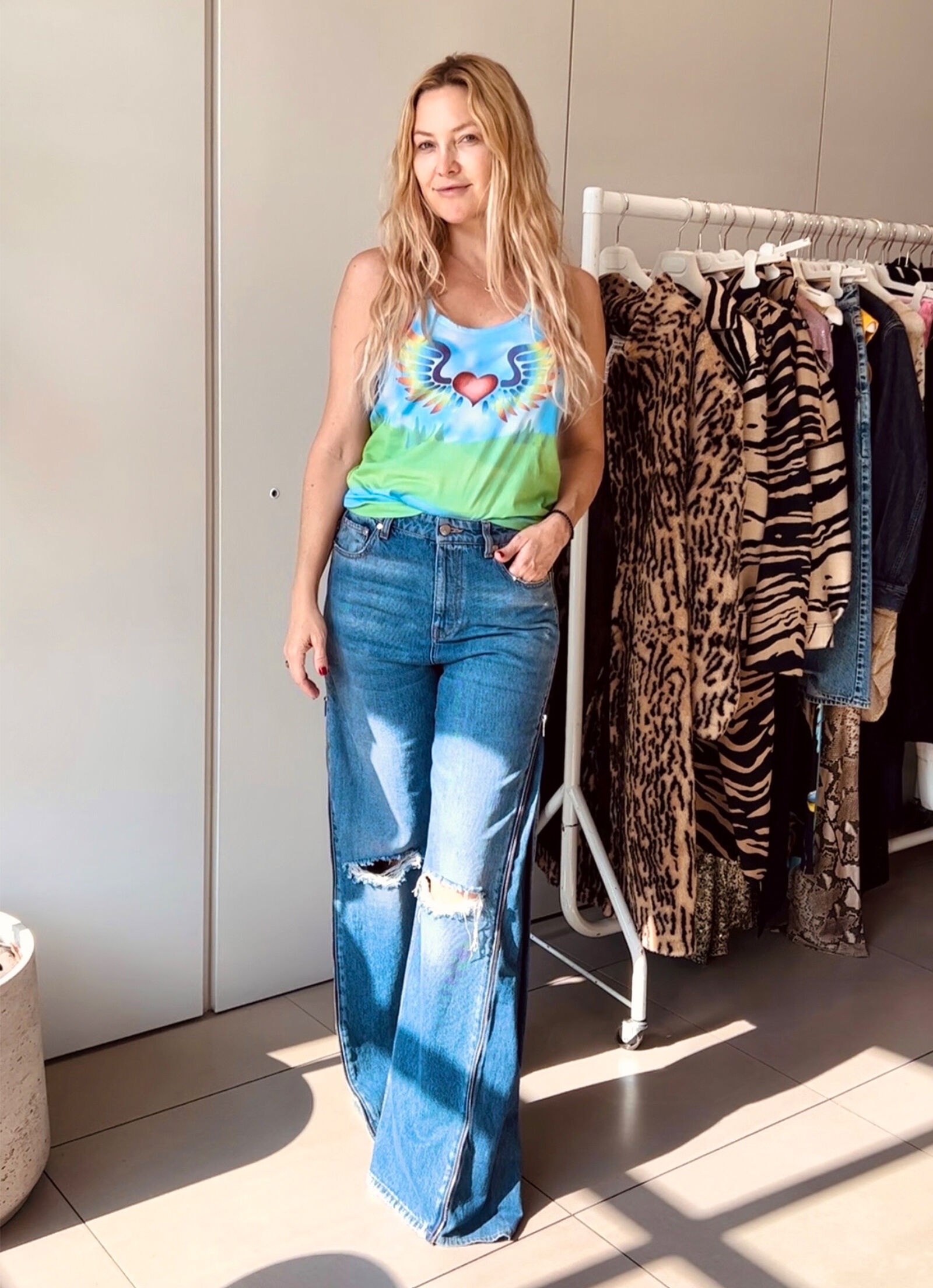 Actor, entrepreneur and Stella friend Kate Hudson wears our exclusive Glastonbury 2023 vest.  Actor, entrepreneur and Stella friend Kate Hudson wears our exclusive Glastonbury 2023 vest.