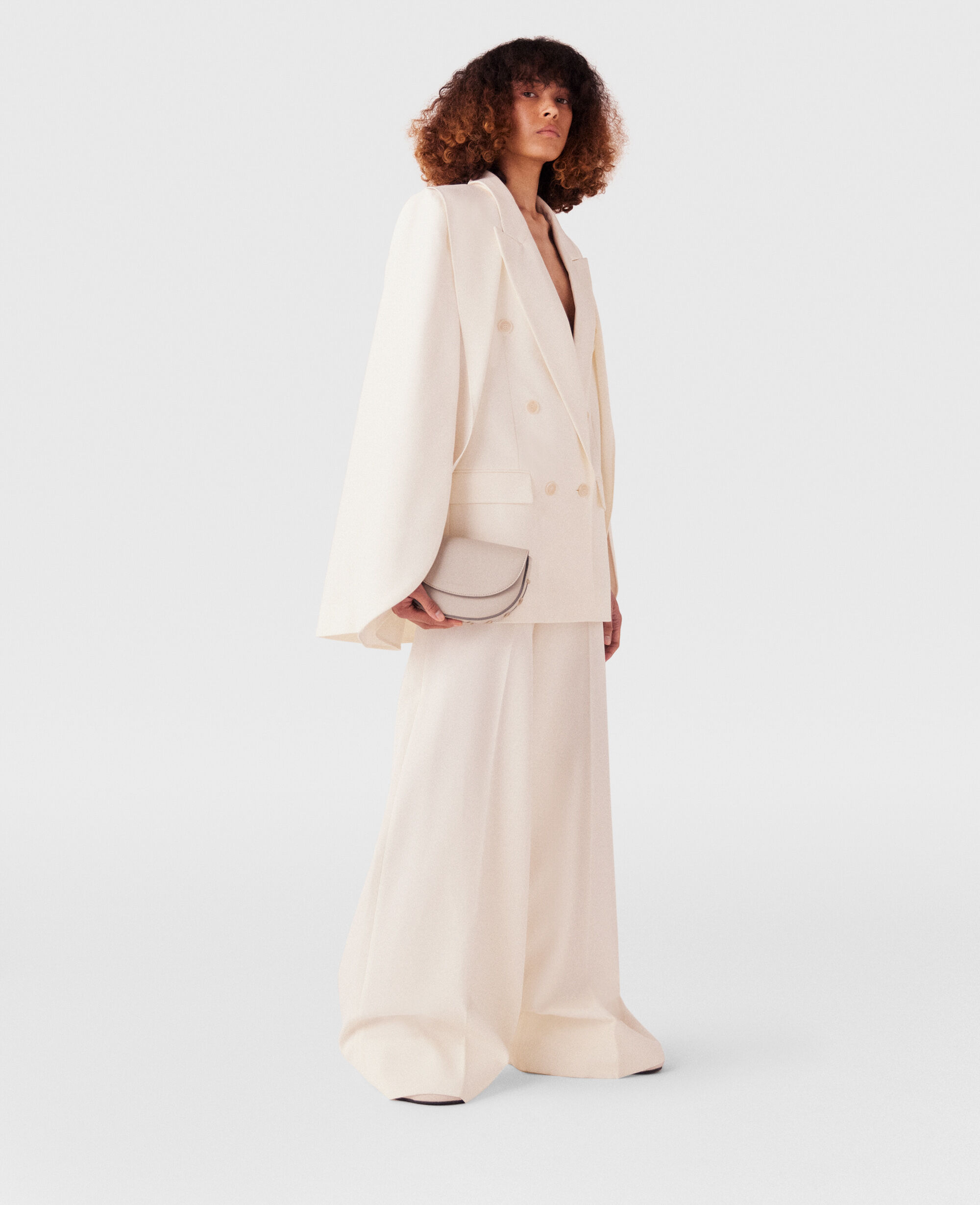 White cape sleeve blazer top