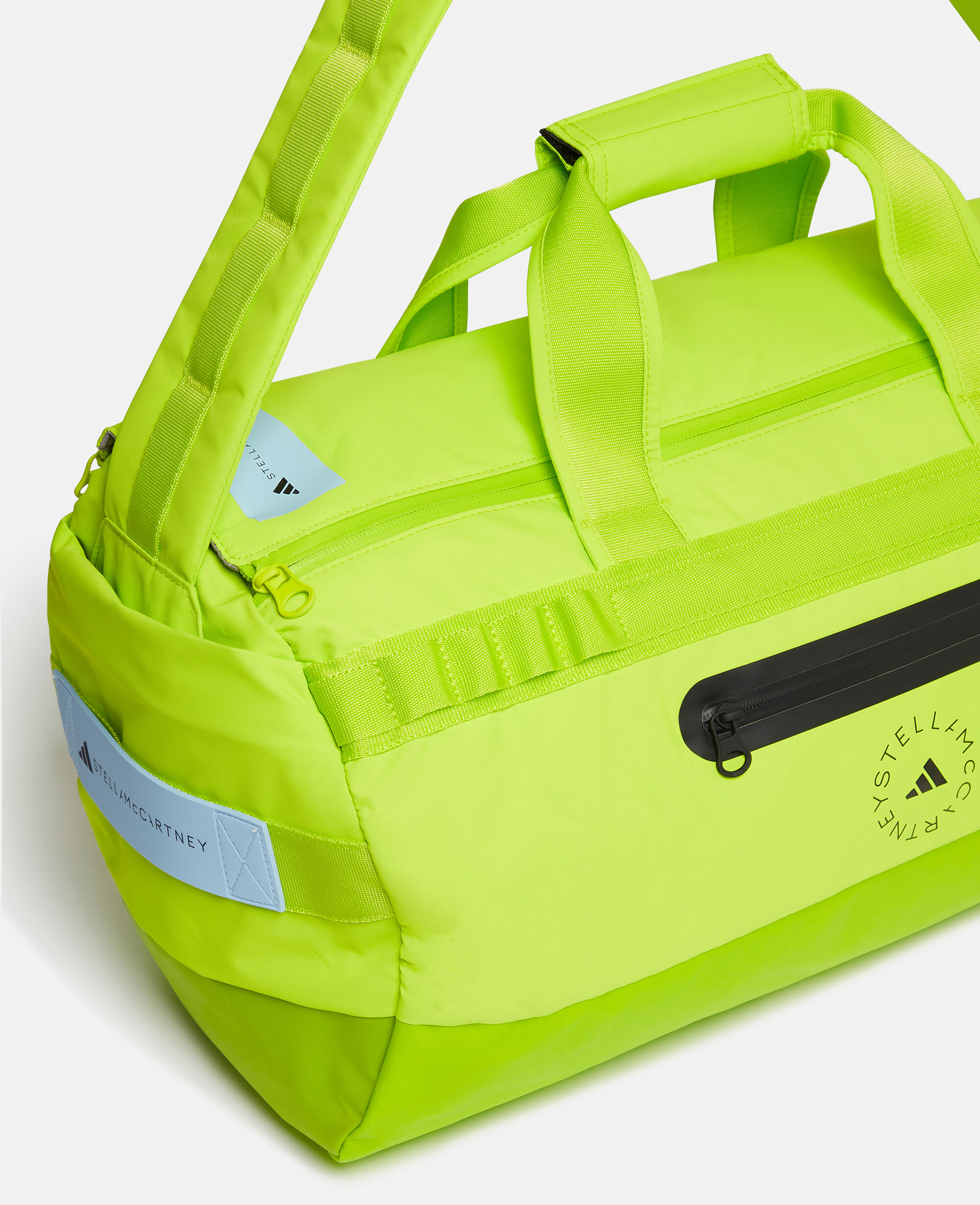 【2025年】お歳暮ギフト Women Semi-Solar Bag 24/7 Logo Blue Slime/Black/Glow ヨガ・ピラティス