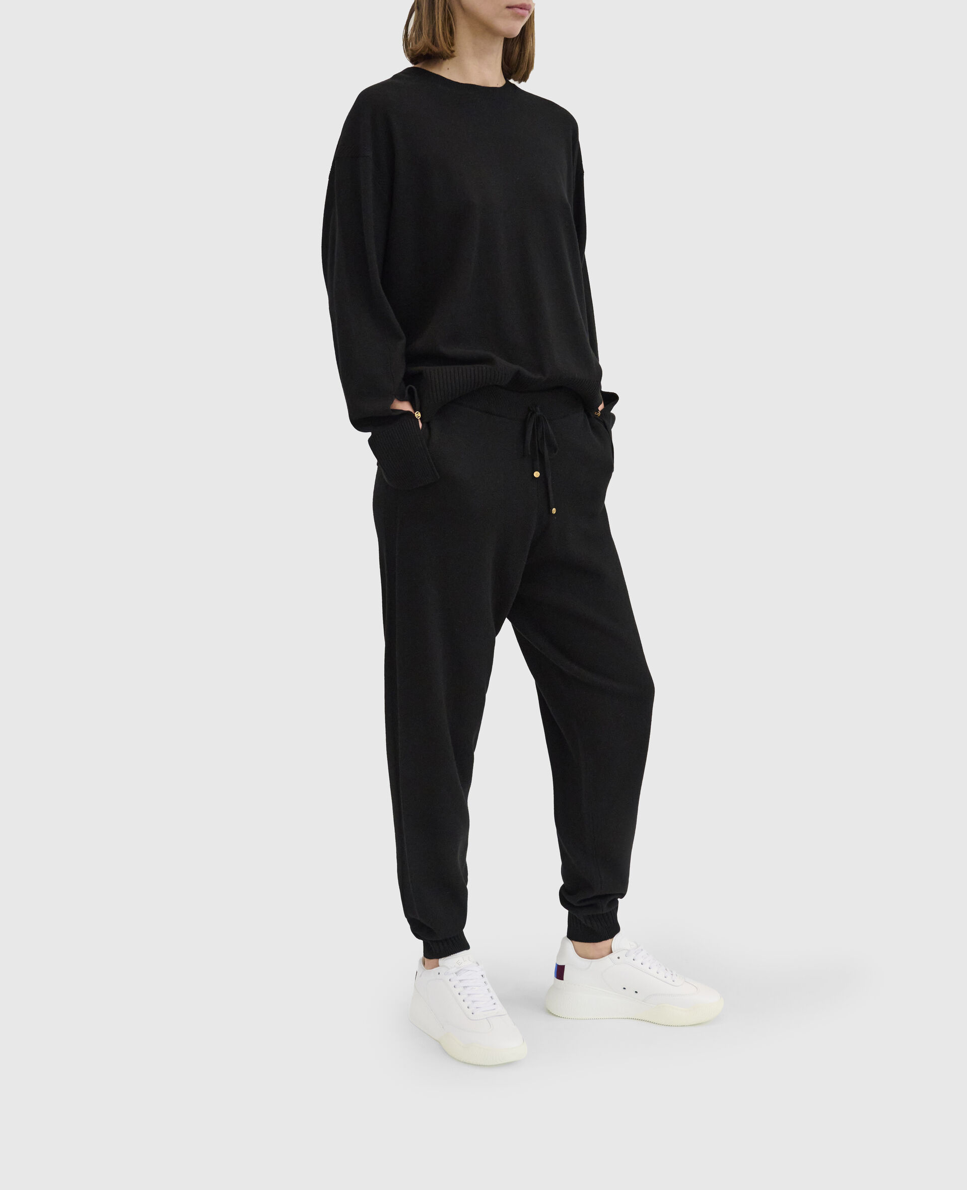 Mid-Rise Tapered Sweatpants-Black-model